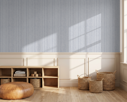 Blue striped wallpaper with white vertical lines in a sunlit modern living room.