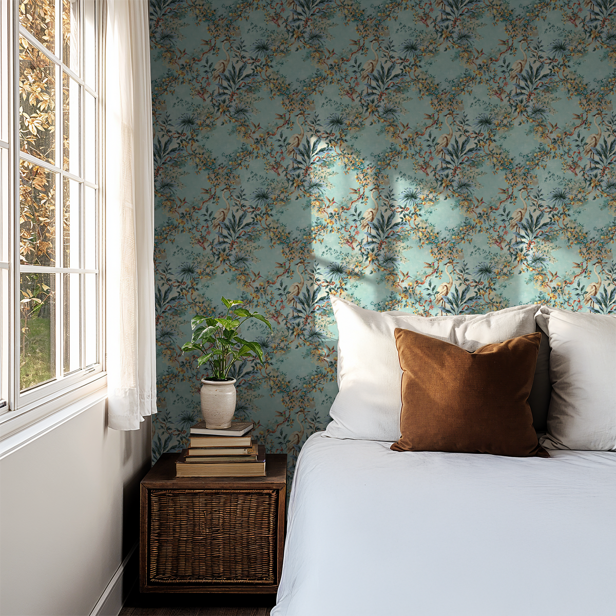 Aviary wallpaper with citrus branches on aqua background in cozy bedroom setting.