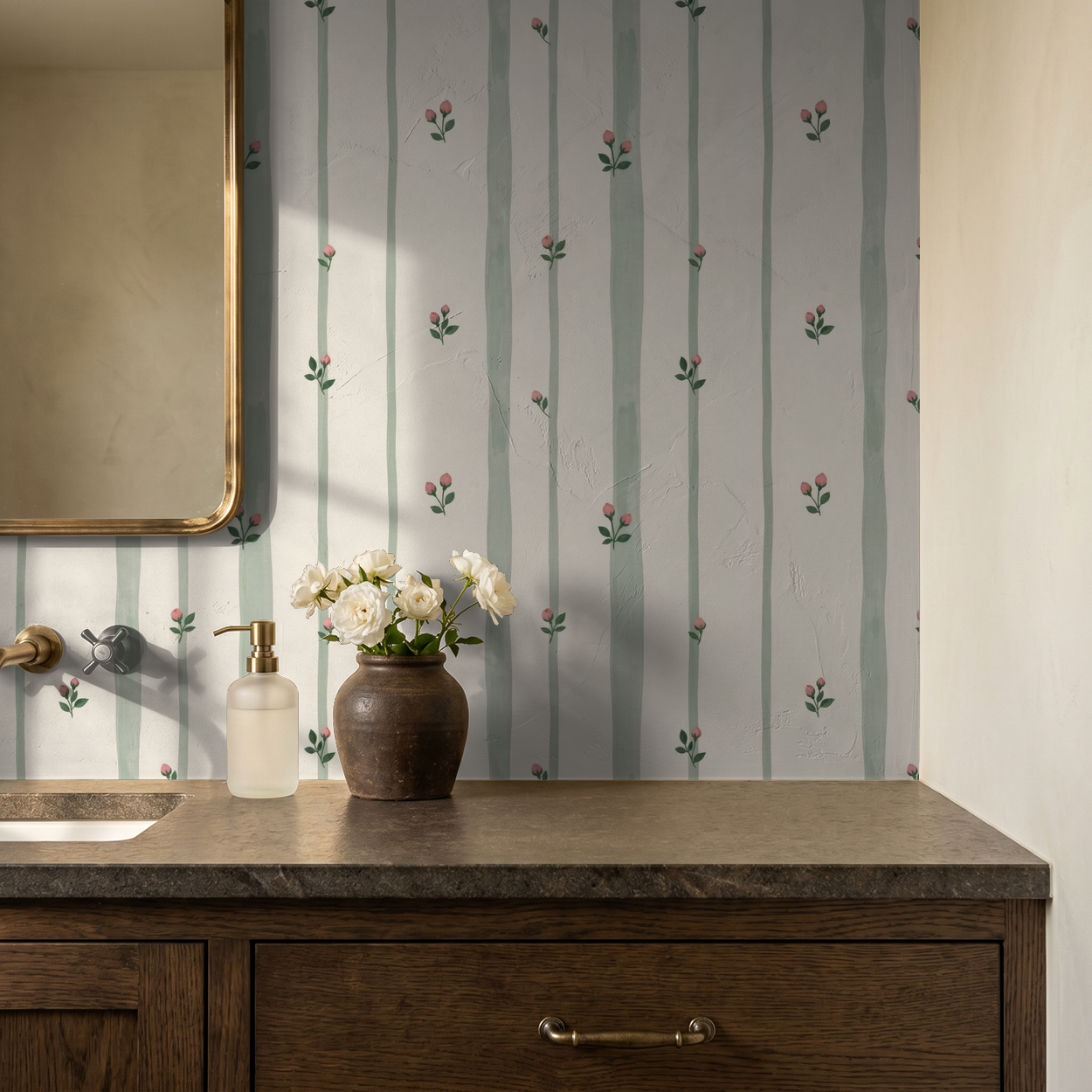 Bordeaux Bloom wallpaper with sage green stripes and pink buds in a rustic bathroom setting.
