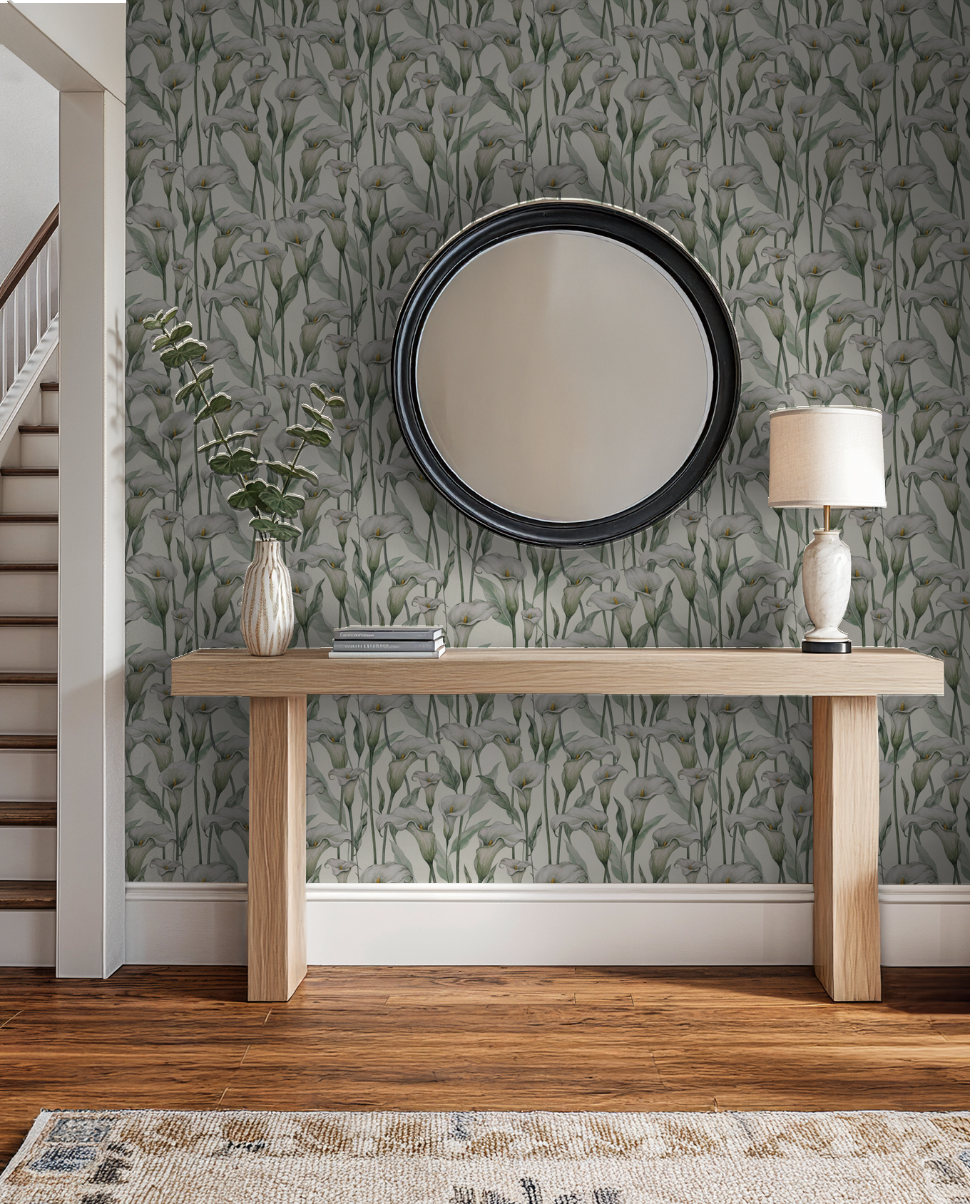 Elegant calla lily wallpaper in a serene hallway with mirror and console table.