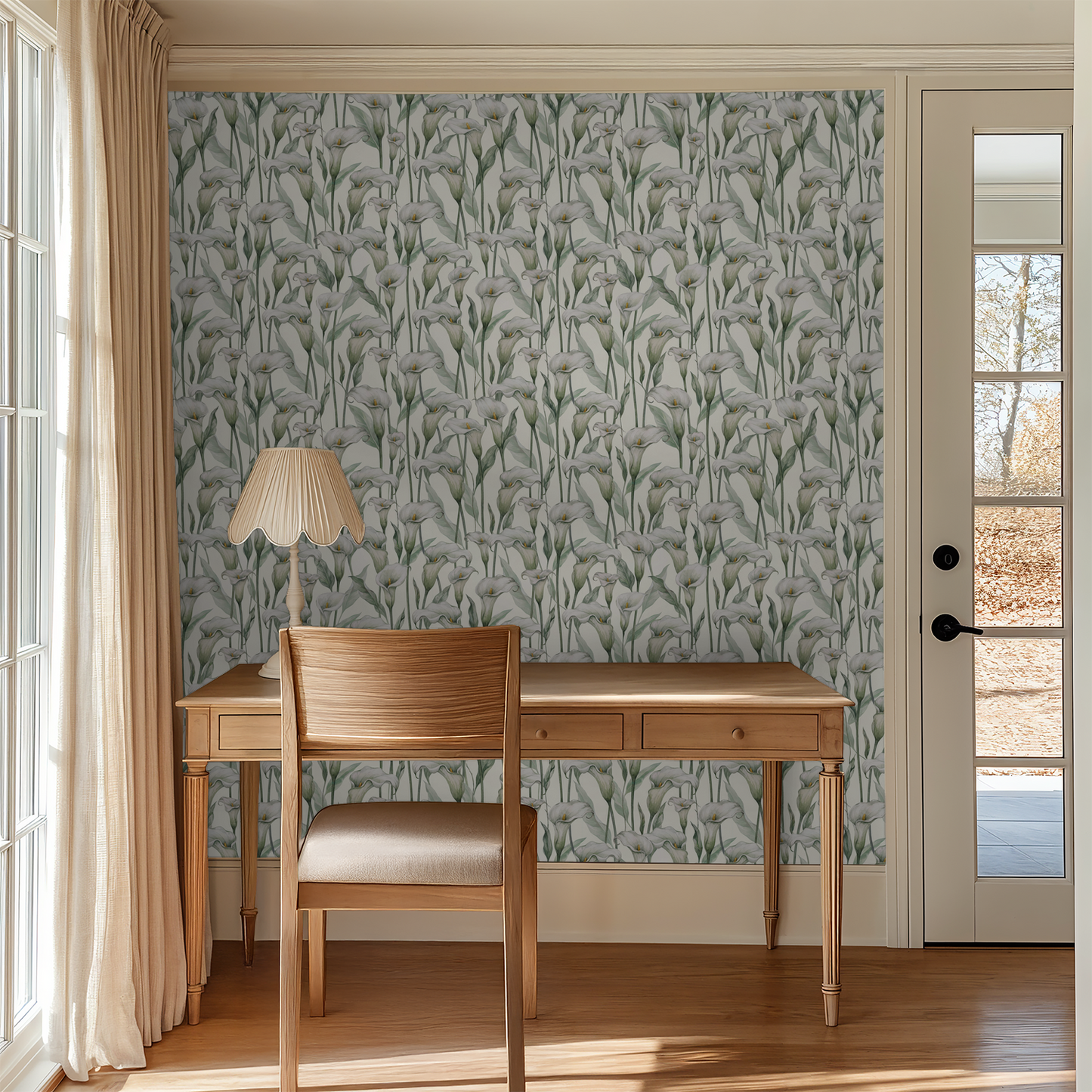 Elegant calla lily wallpaper in serene home office setting with natural wood desk.