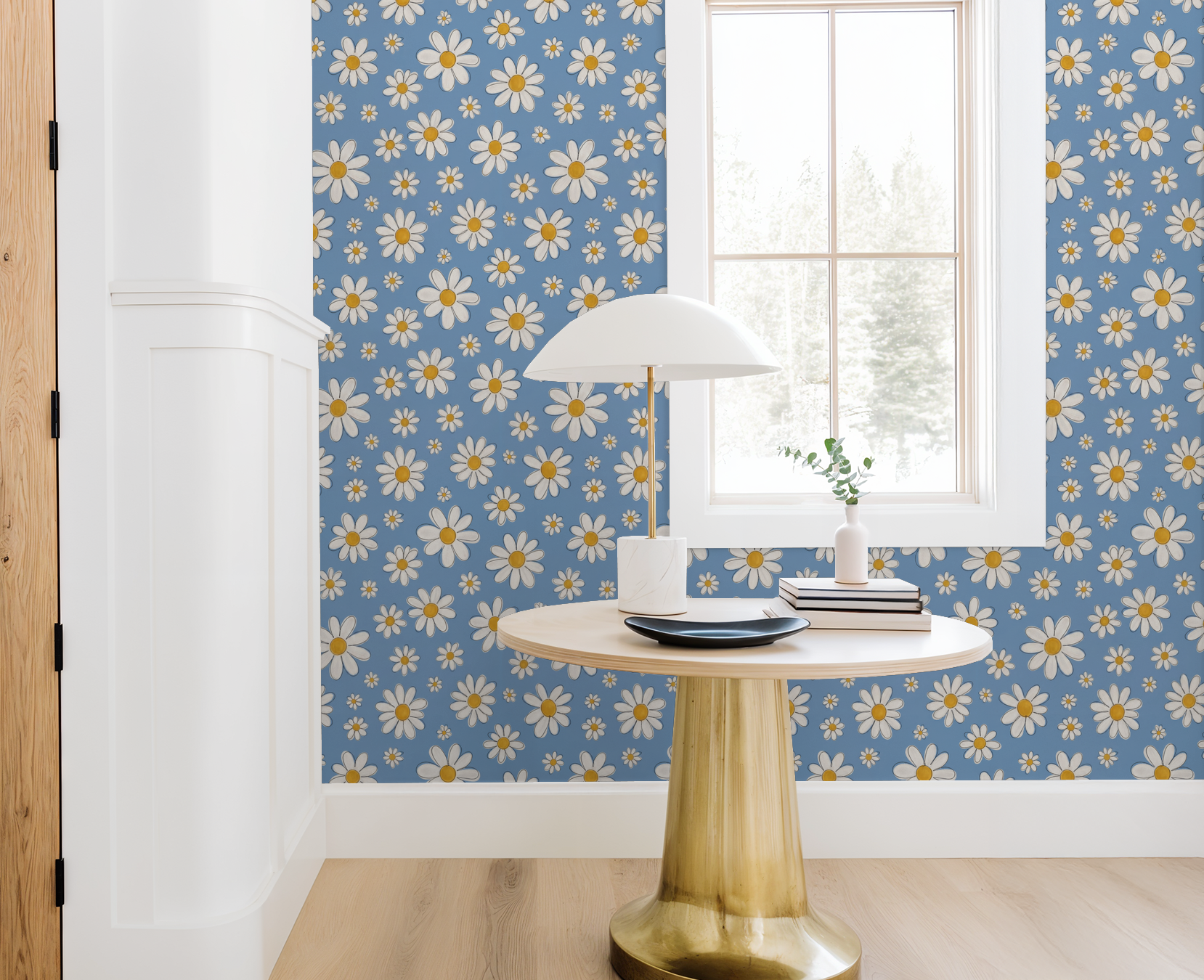 Daisy Delight wallpaper with white daisies on blue in modern room with table and lamp.