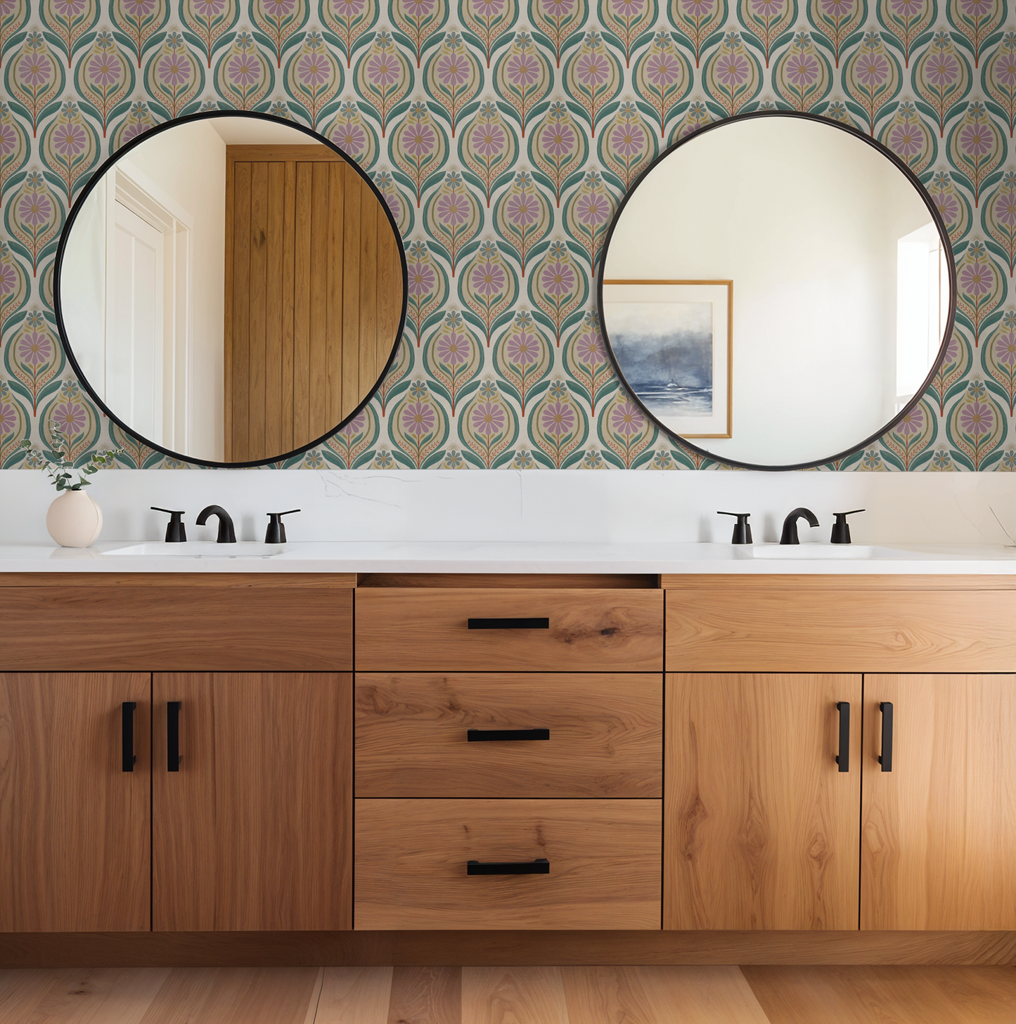 Flora Mae lilac floral wallpaper in bathroom with wood vanity and round mirrors.