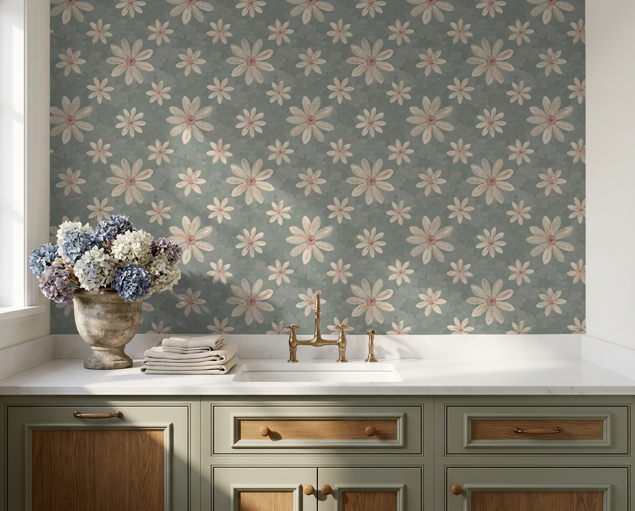 Floral wallpaper with creamy white and dusty pink daisies on sage background in kitchen setting.
