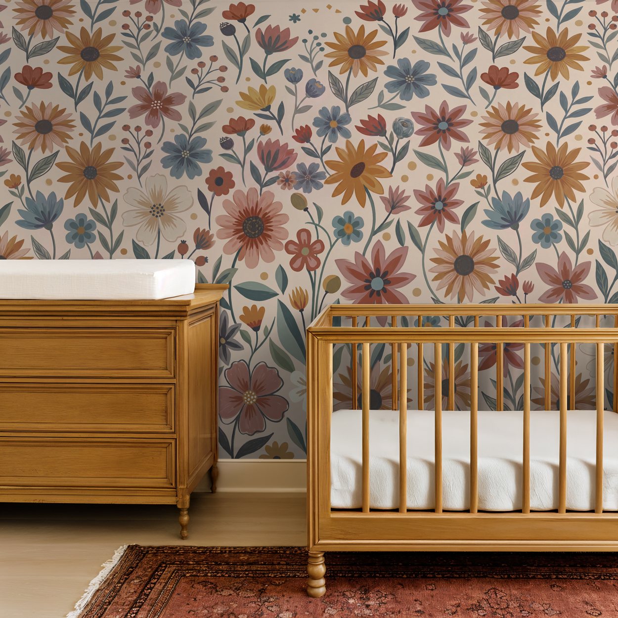 Floral wallpaper with terracotta, mustard, and blue flowers in a nursery setting.