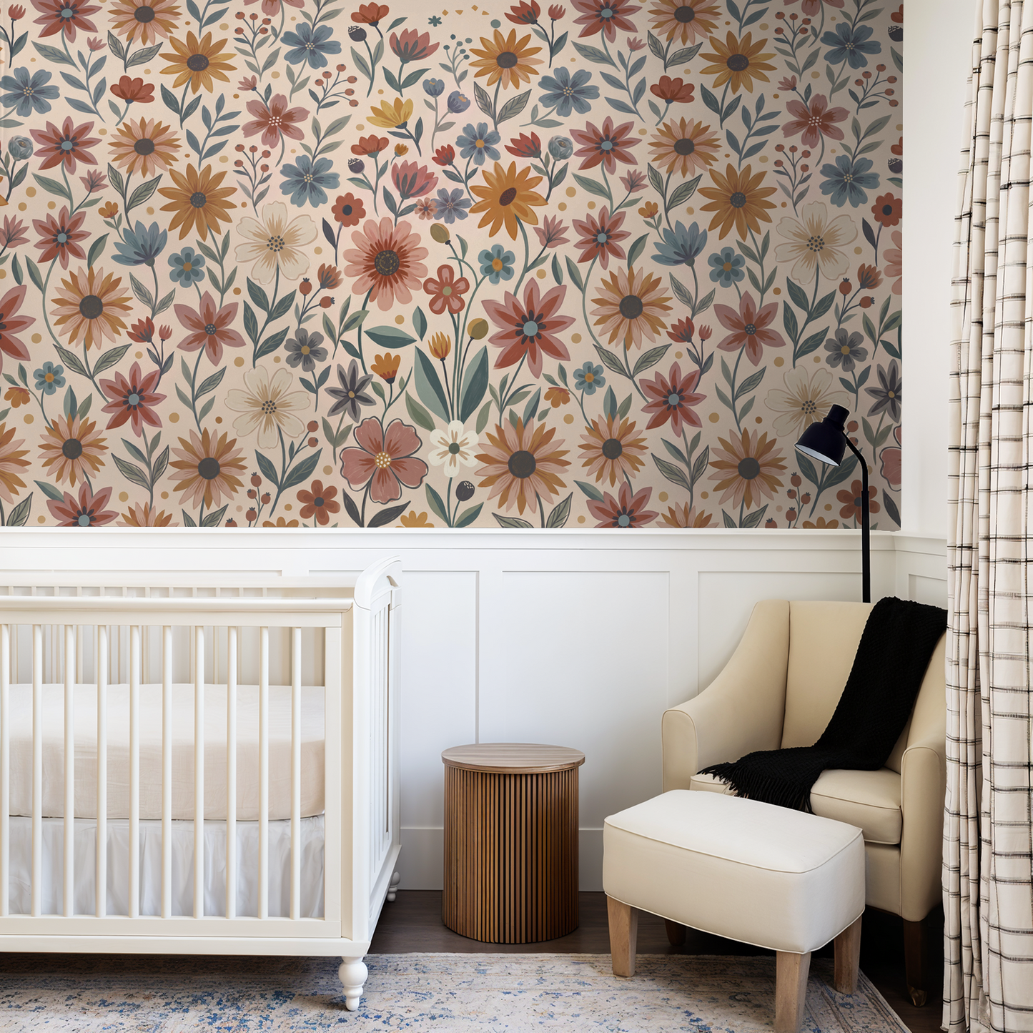 Floral wallpaper with terracotta, mustard, and blue flowers in a cozy nursery.