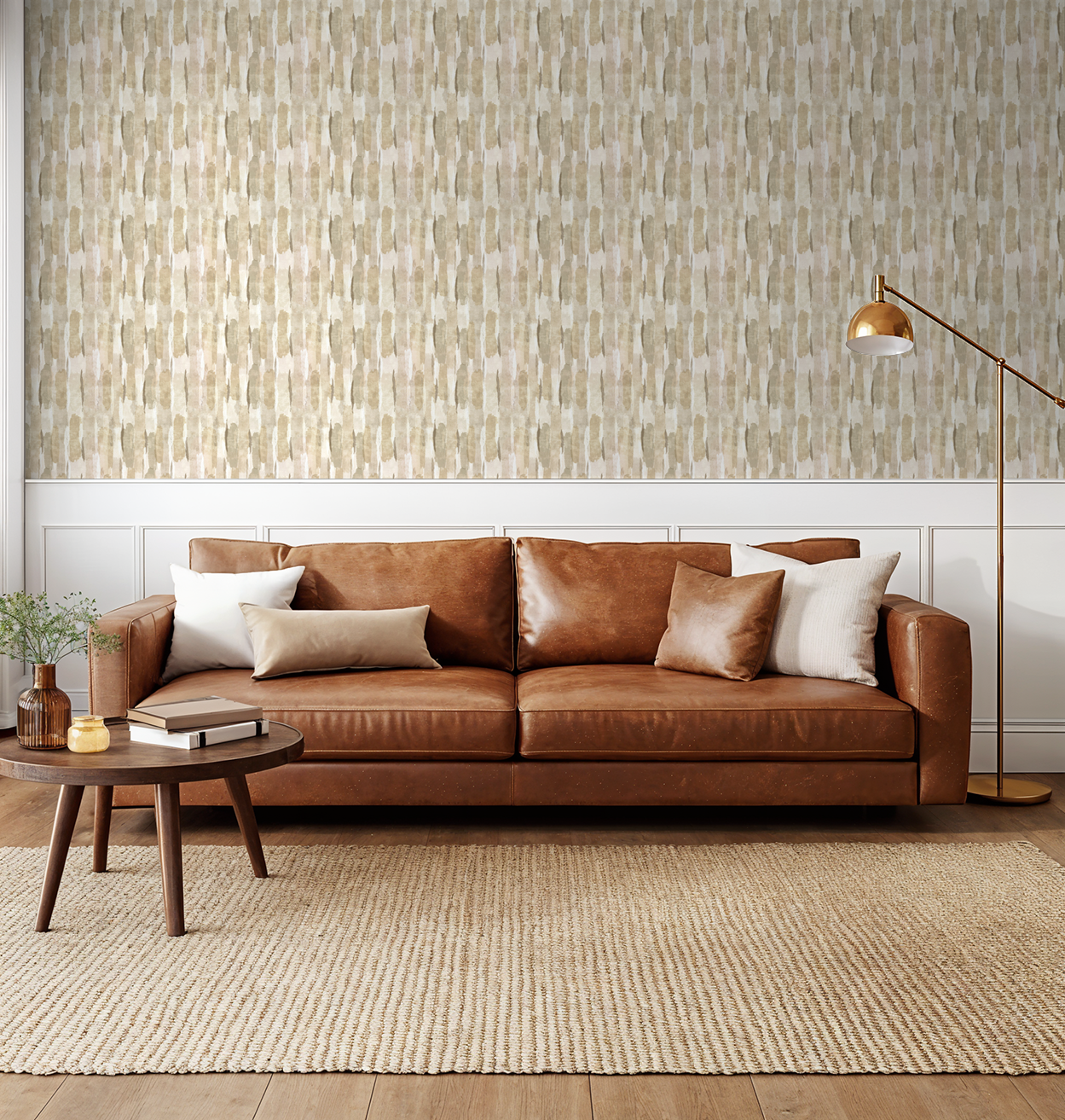 Gold Sweep wallpaper with earthy tones in a modern living room with leather sofa.