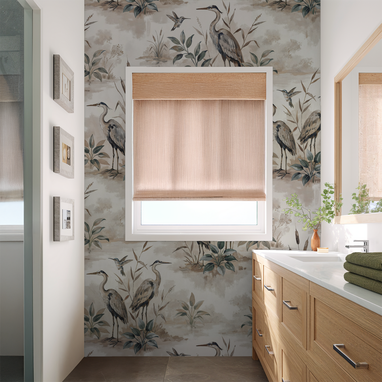 Heron Bay wallpaper in bathroom with heron and foliage design in taupe and sage tones.