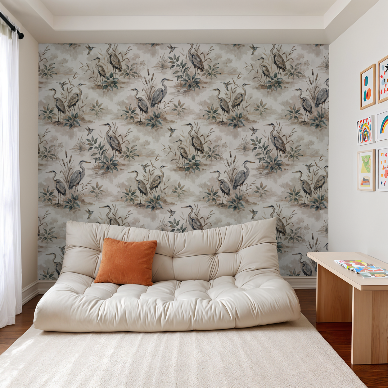 Heron Bay wallpaper with herons and foliage in taupe, sage, and dusty blue in a cozy living room.