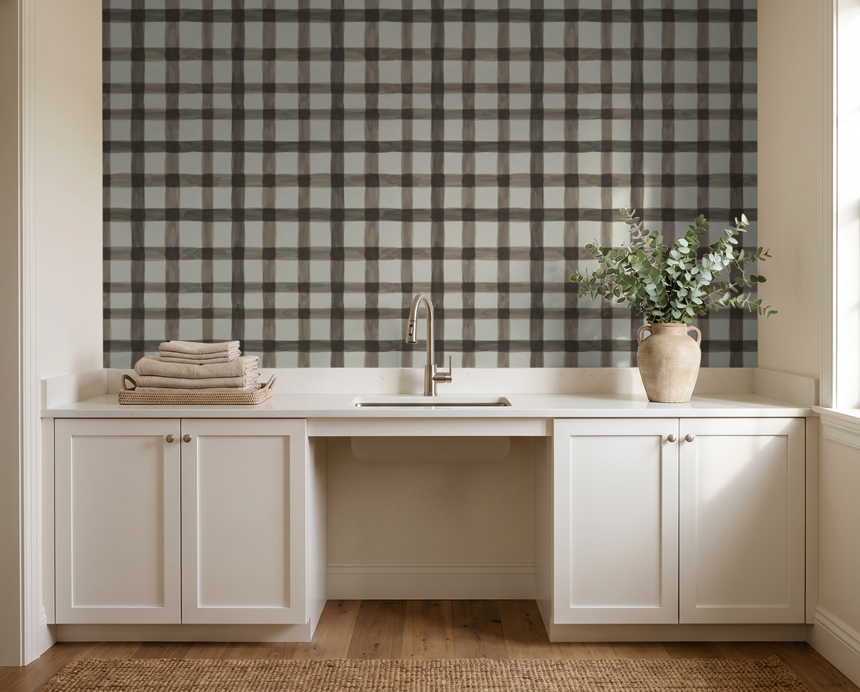 Latticed Autumn plaid wallpaper in muted browns and creams in a modern laundry room.