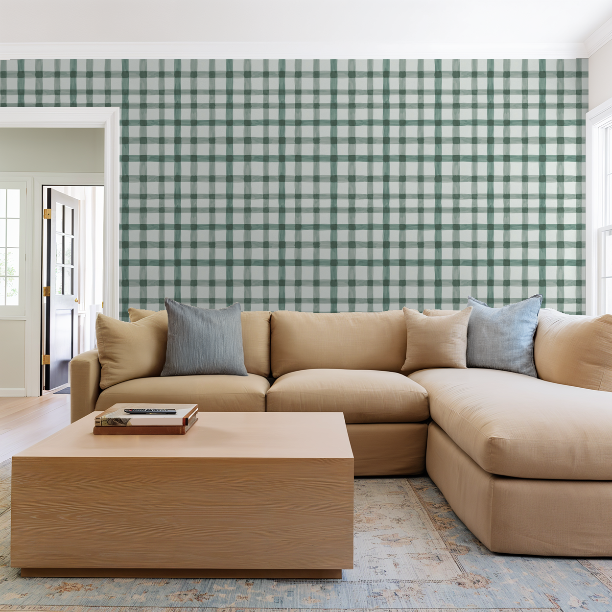 Latticed Sage wallpaper in a modern living room with a beige sectional sofa.