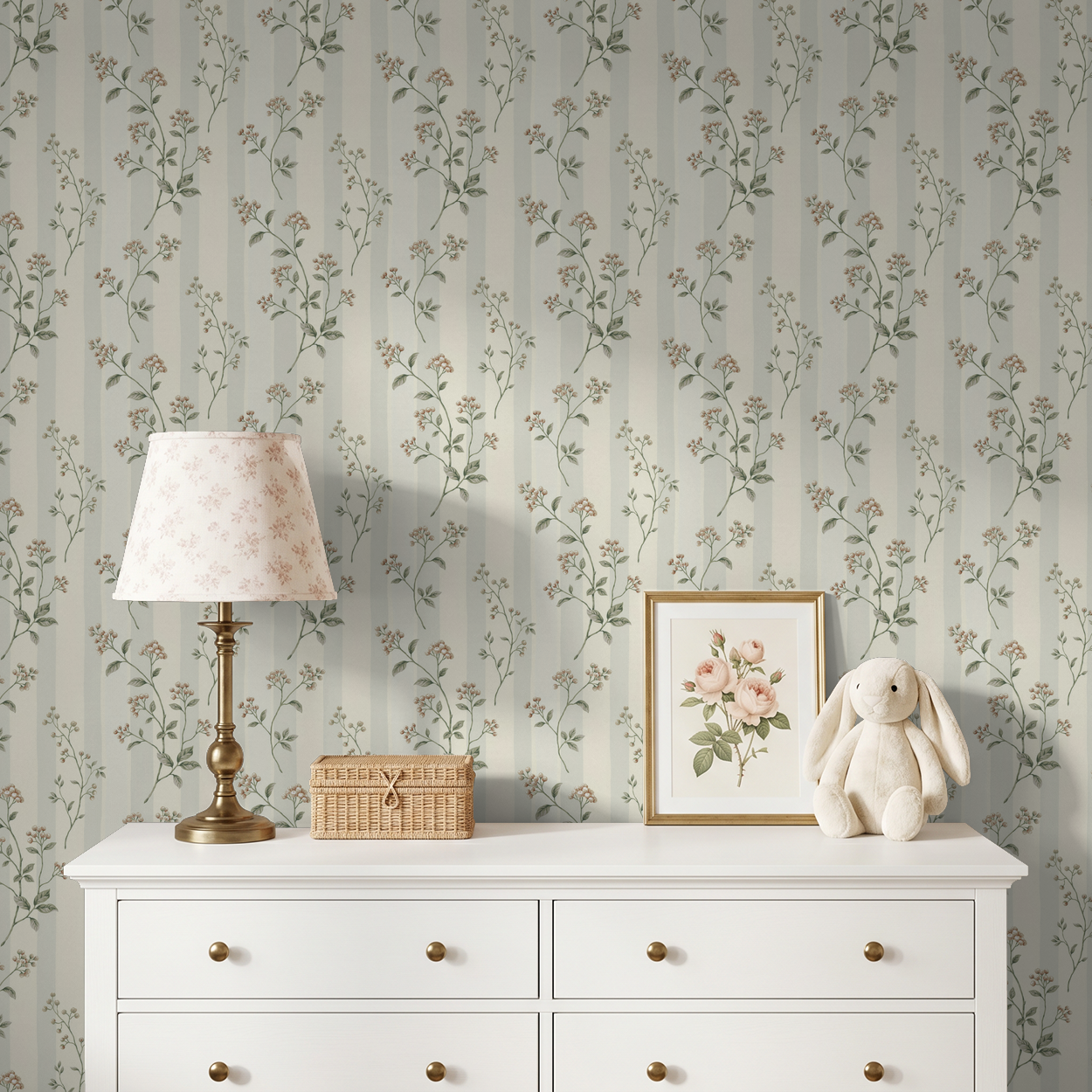 Leaf & Stripe wallpaper with delicate sprigs and stripes in a cozy nursery setting.