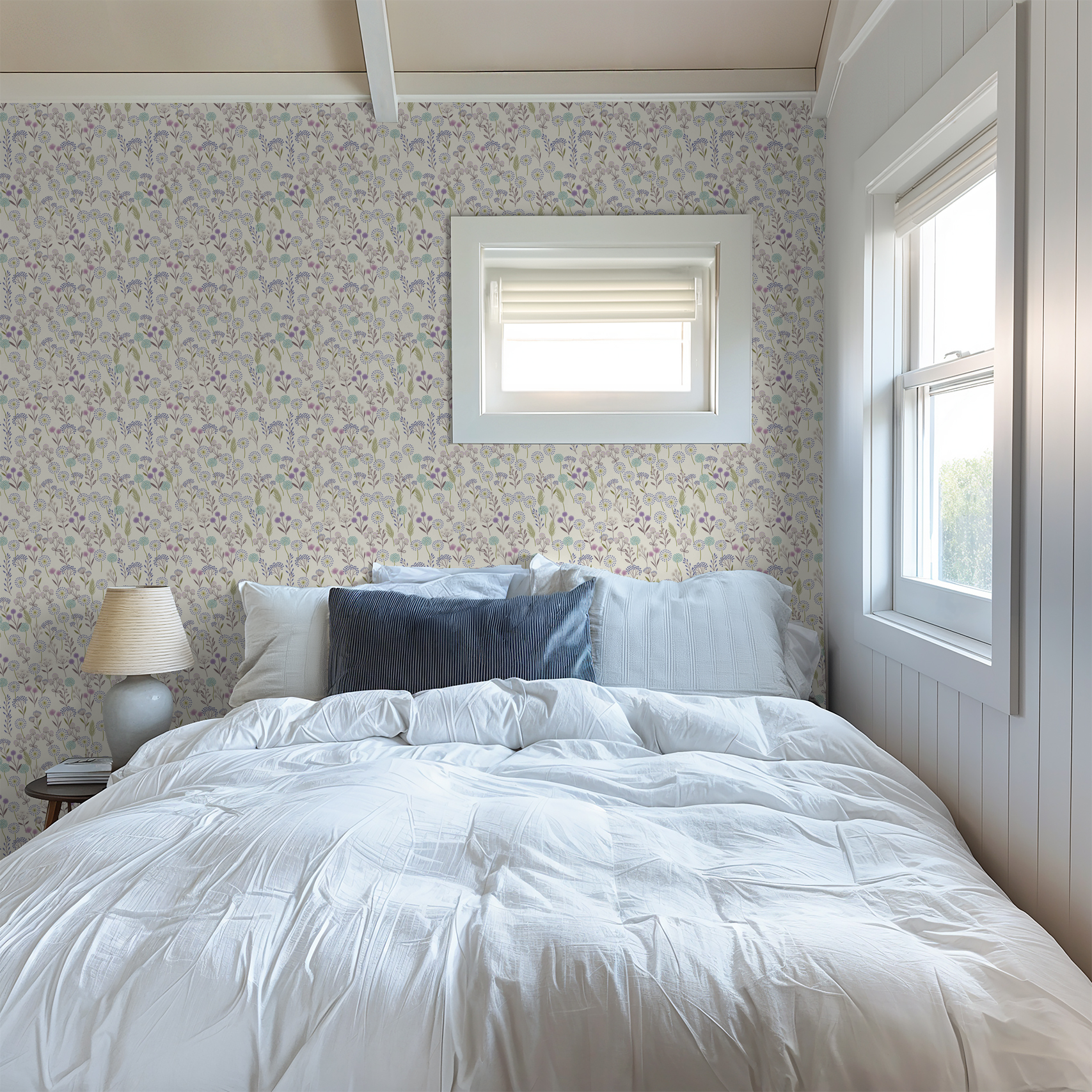 Bedroom with floral wallpaper in lavender, teal, sage on cream background.