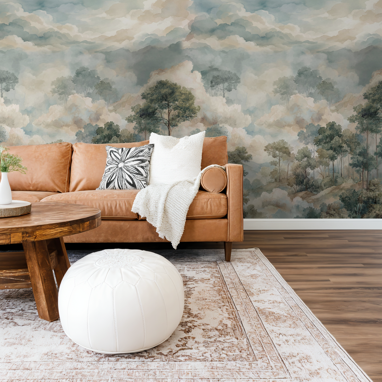 Nature-inspired wallpaper with trees and clouds in a cozy living room setting.