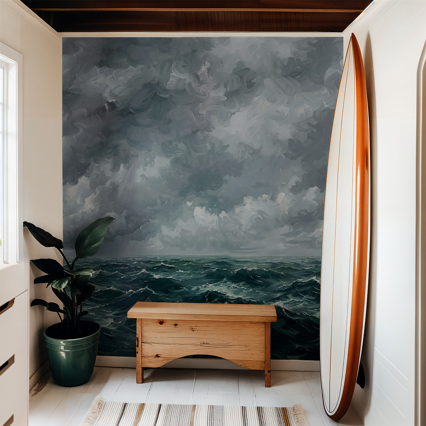 Teal and navy ocean wave wallpaper in coastal entryway with wooden bench and surfboard.