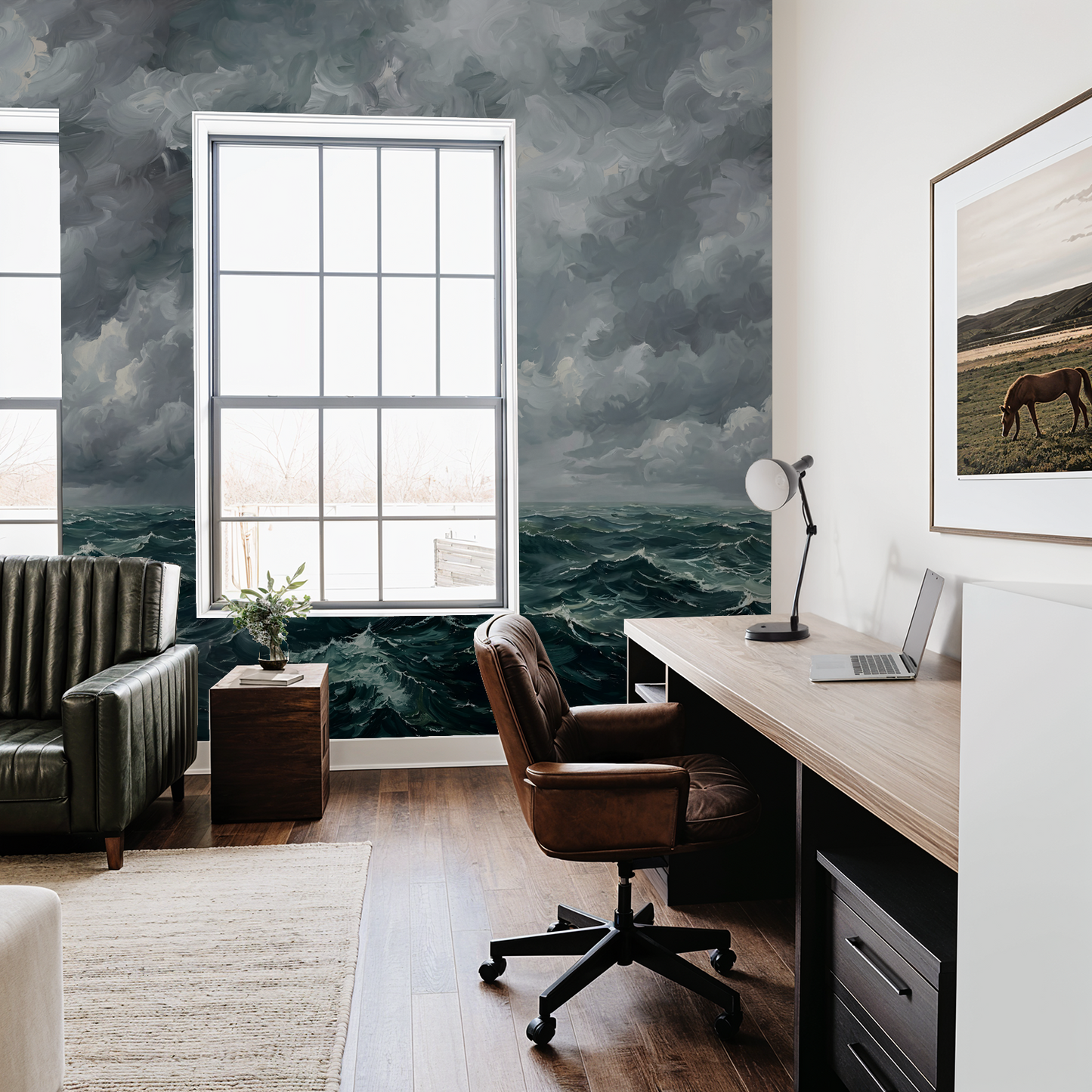 Dramatic teal and navy ocean wave wallpaper in modern office with desk and chair.