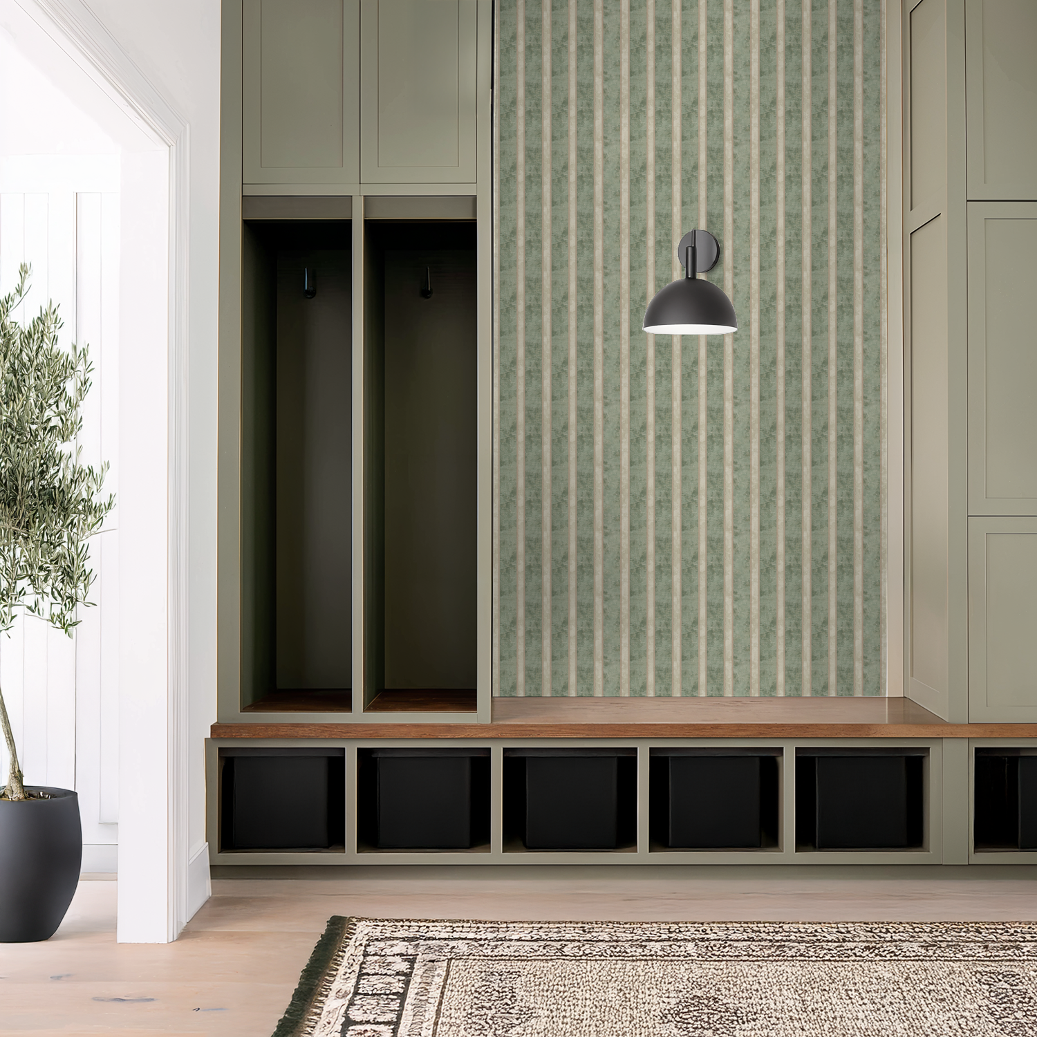 Muted sage and cream striped wallpaper in modern room with storage and rug.