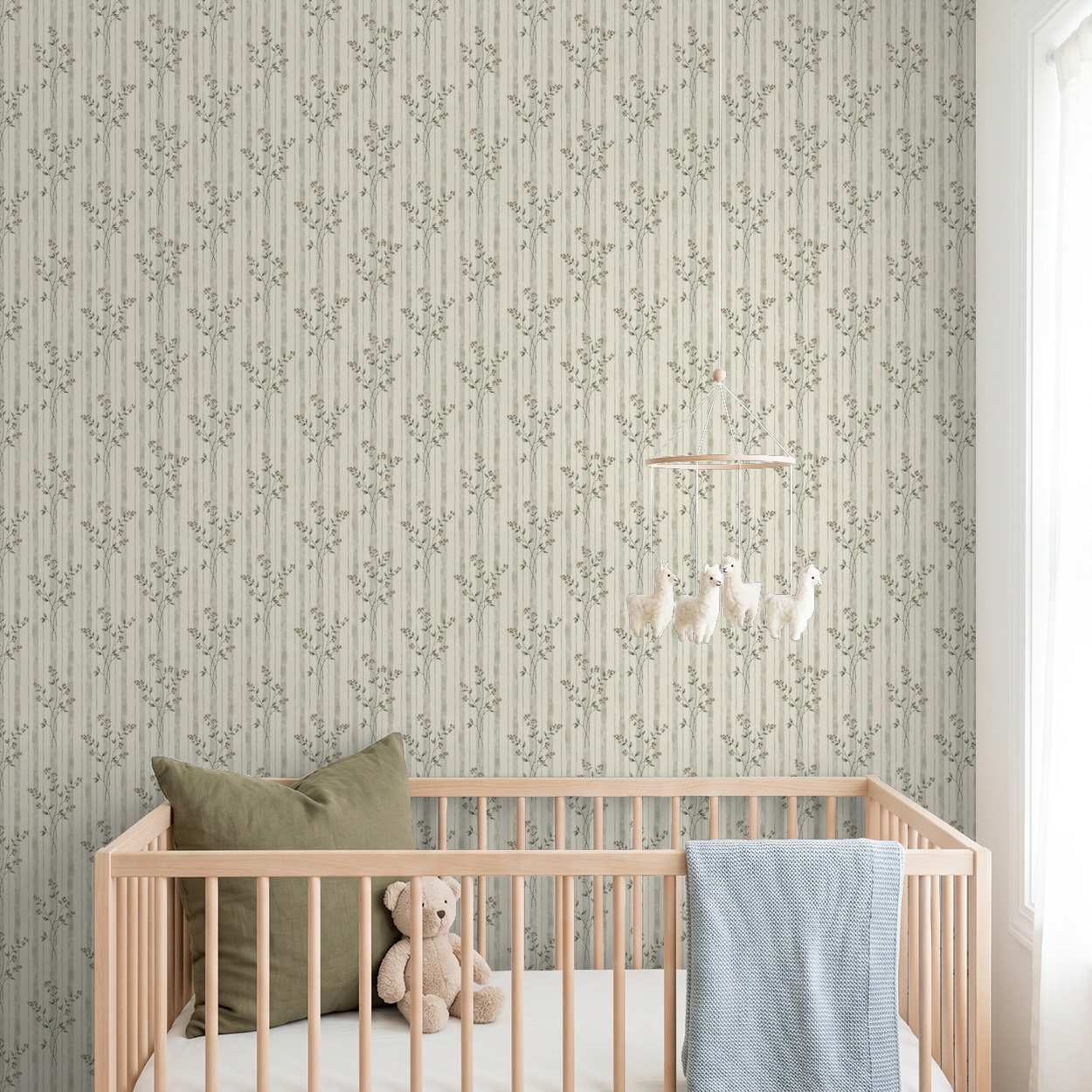 Nursery with Opulent Blossom wallpaper, floral stripes, teddy bear in crib.