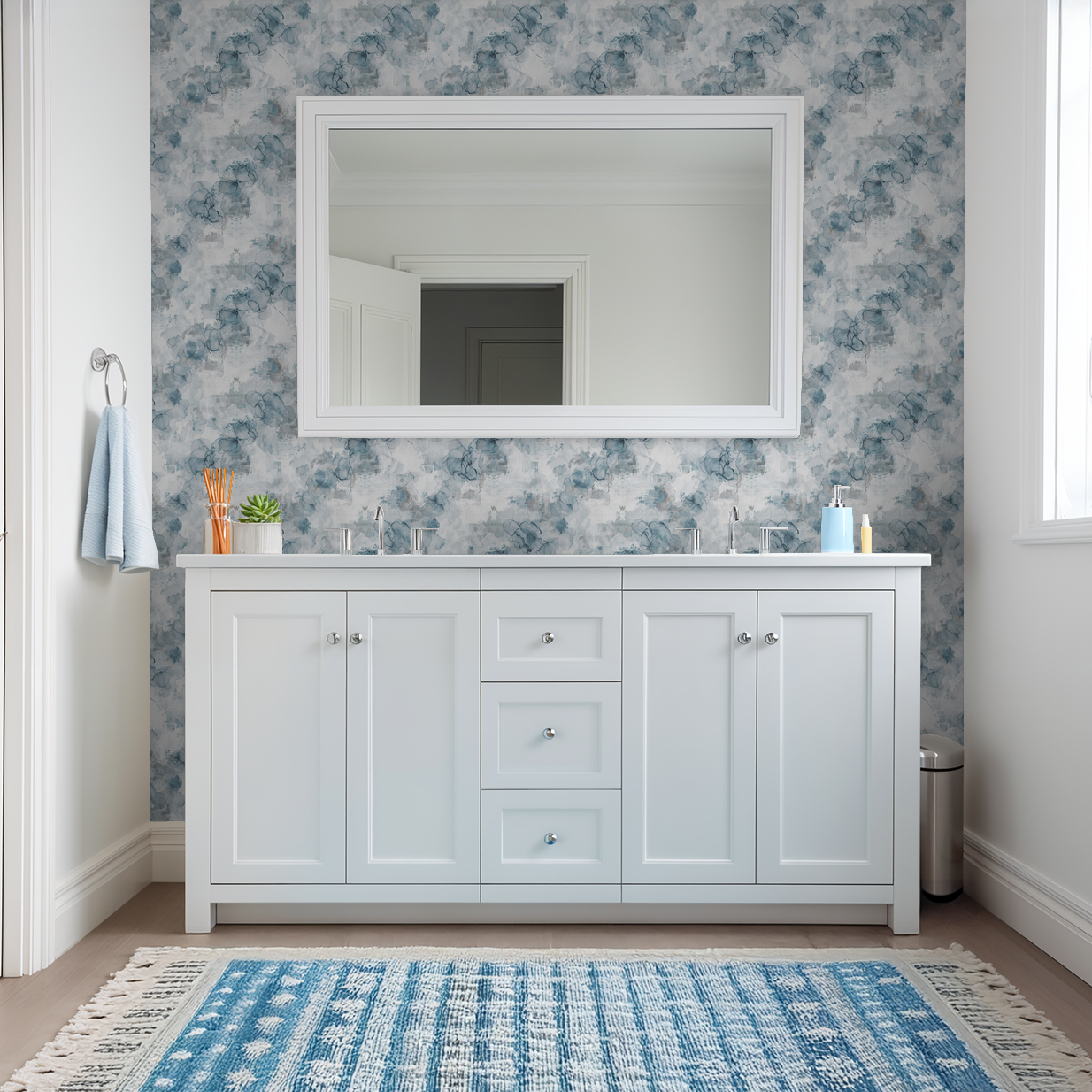 Bathroom with Parisian Mist watercolor wallpaper in soft blues and grays