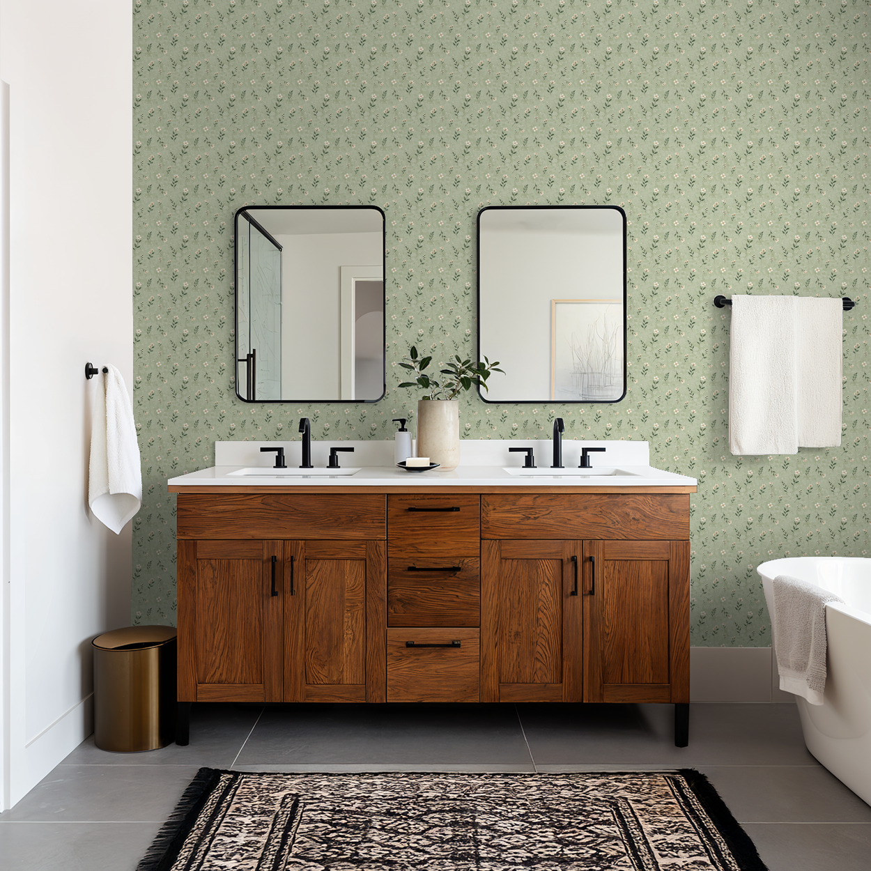 Sage floral wallpaper in modern bathroom with wood vanity and mirrors.