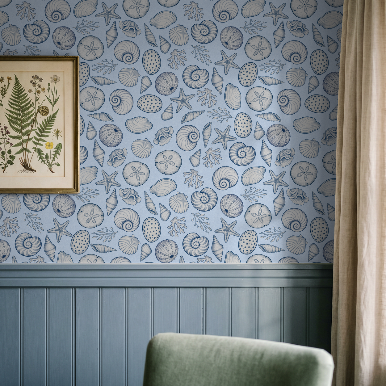 Coastal seashell wallpaper in blue with marine illustrations in a living room setting.