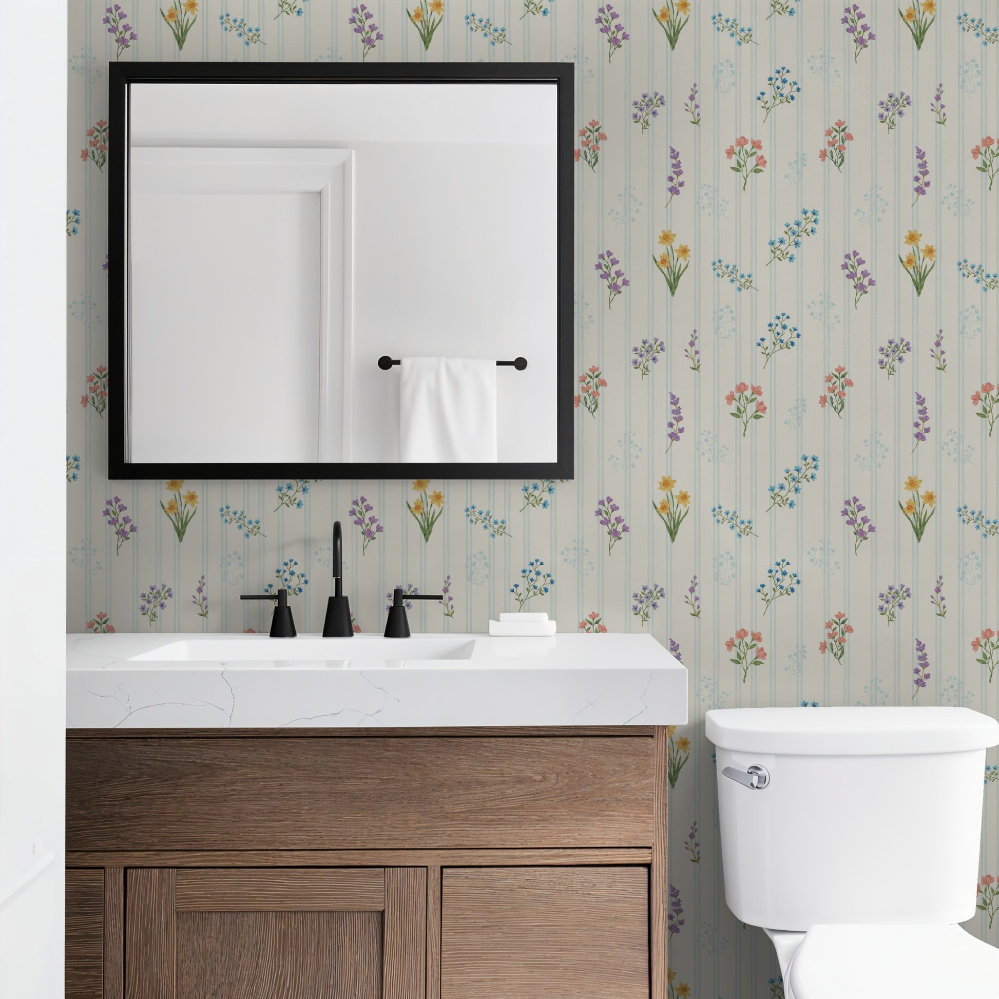 The Juliet floral wallpaper with pastel bouquets in a bathroom setting.