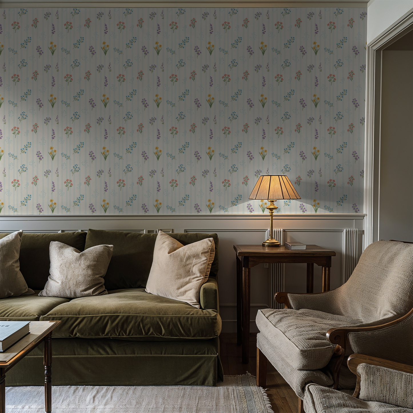 The Juliet wallpaper with floral bouquets on creamy backdrop in cozy living room.