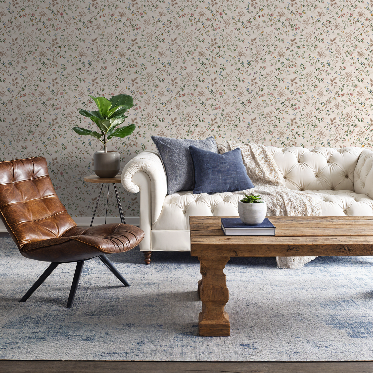 Vintage floral wallpaper with pastel hues in elegant living room setting.