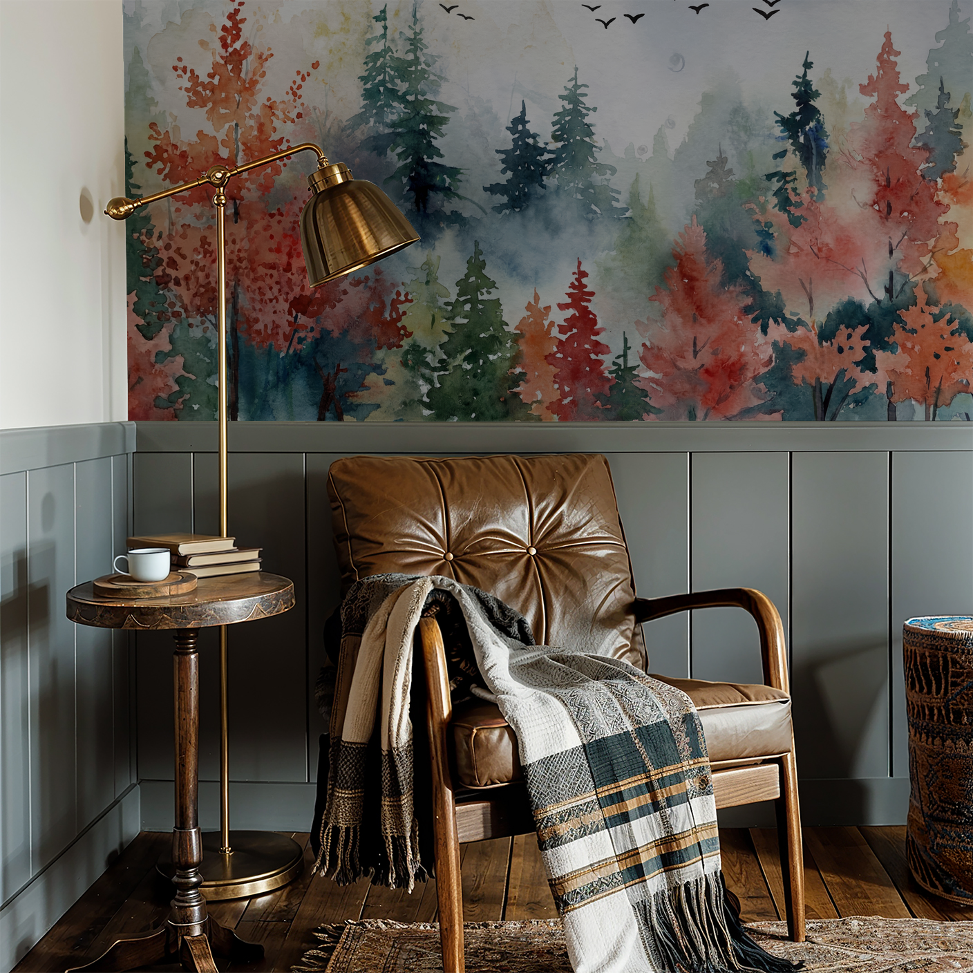 Watercolor autumn landscape wallpaper in cozy reading nook with leather chair and lamp.